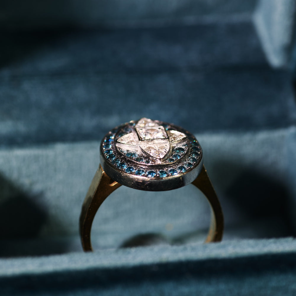 Blue Diamond Star-Crossed Ring in its MÌREL velvet box